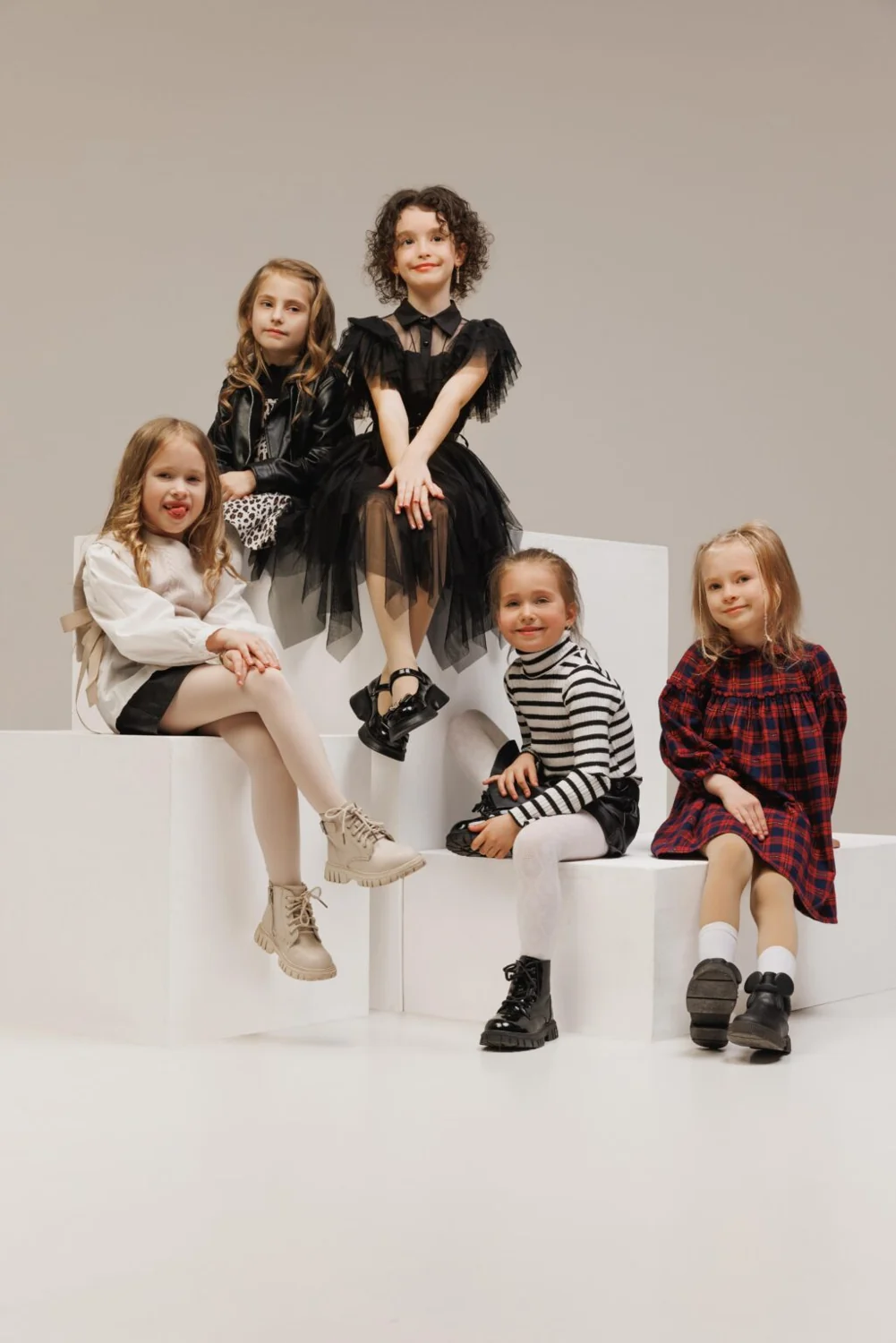 A group of young models in a studio portrait